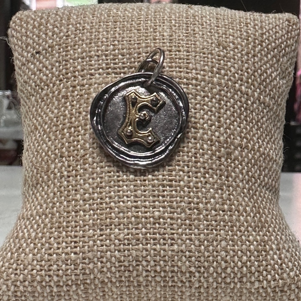 Waxing Poetic Rivet Insignia E